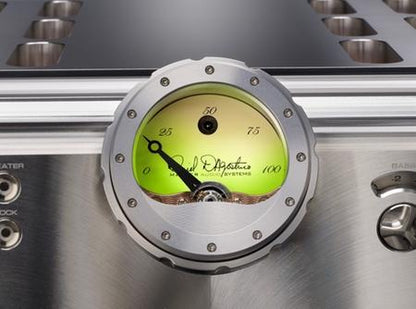 Close up of glowing green dial on silver Momentum Preamplifier